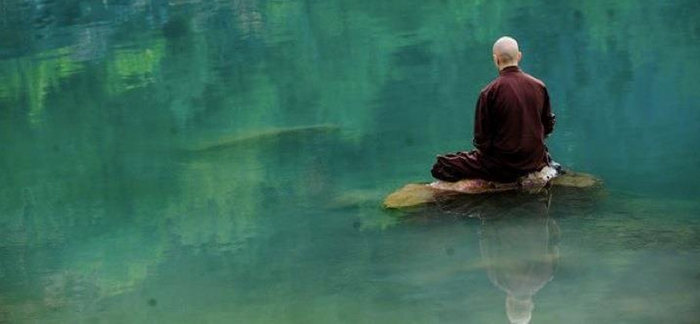 Masterthebody.com Breathing and meditation on rock in water